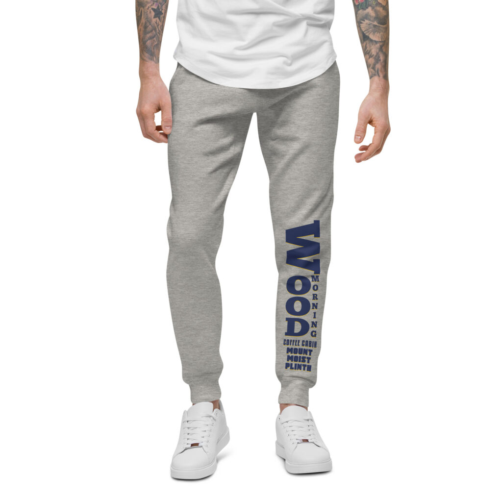 Model wearing Wood Morning Coffee Cabin Heritage Grey Sweatpants Navy/Gold